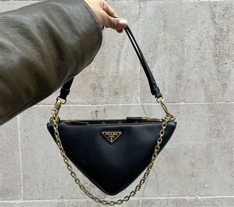 prada triangluar purse|Prada triangle bag dupe.